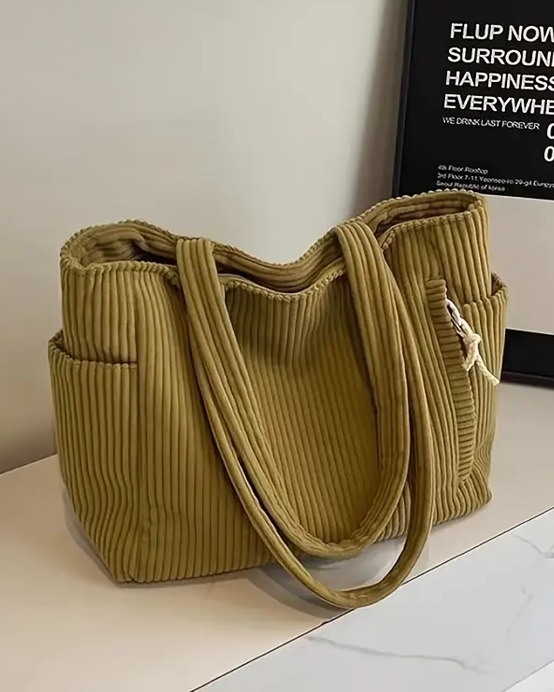 Nika | RIBBED TOTE BAG WITH DRAWSTRING DETAIL