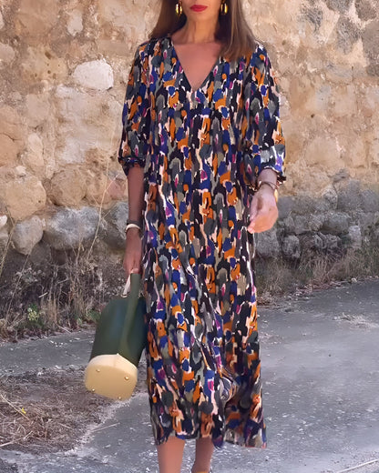 Carla – Long V-Neck Dress with Retro Pattern