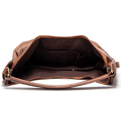 Sienna - Elegant Tassel Hollow Out Shoulder Bag